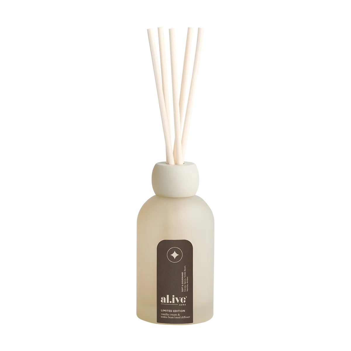 al.ive body Vanilla Cream & Tonka Bean Reed Diffuser in frosted glass vessel with reeds