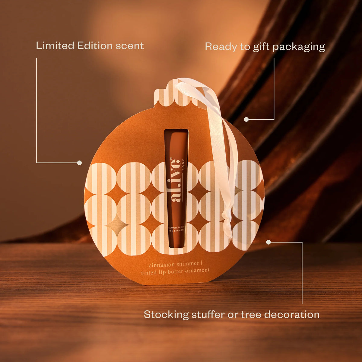 al.ive body Tinted Lip Butter Ornament, a stocking stuffer or tree decoration