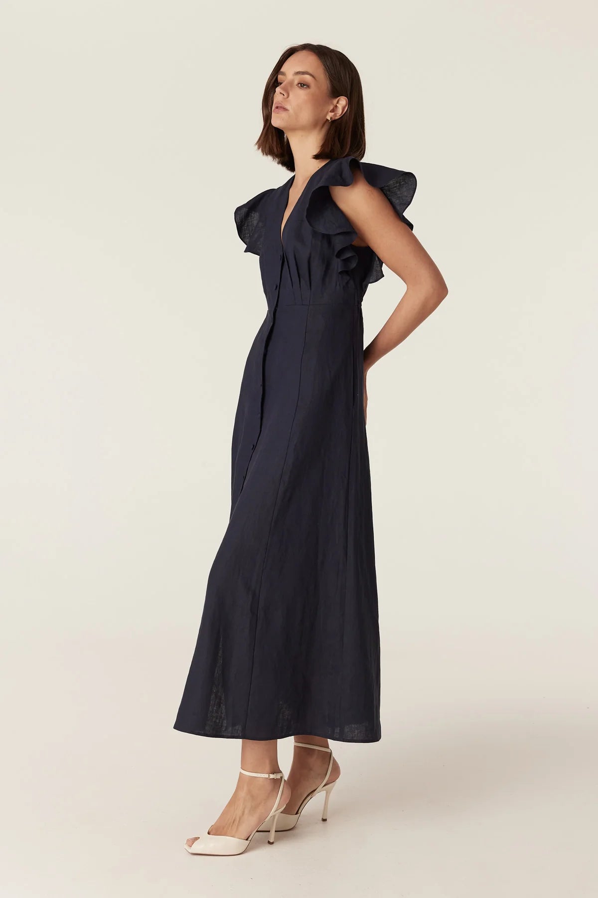 Cable Melbourne Bellevue Linen Dress in Navy, worn - side view
