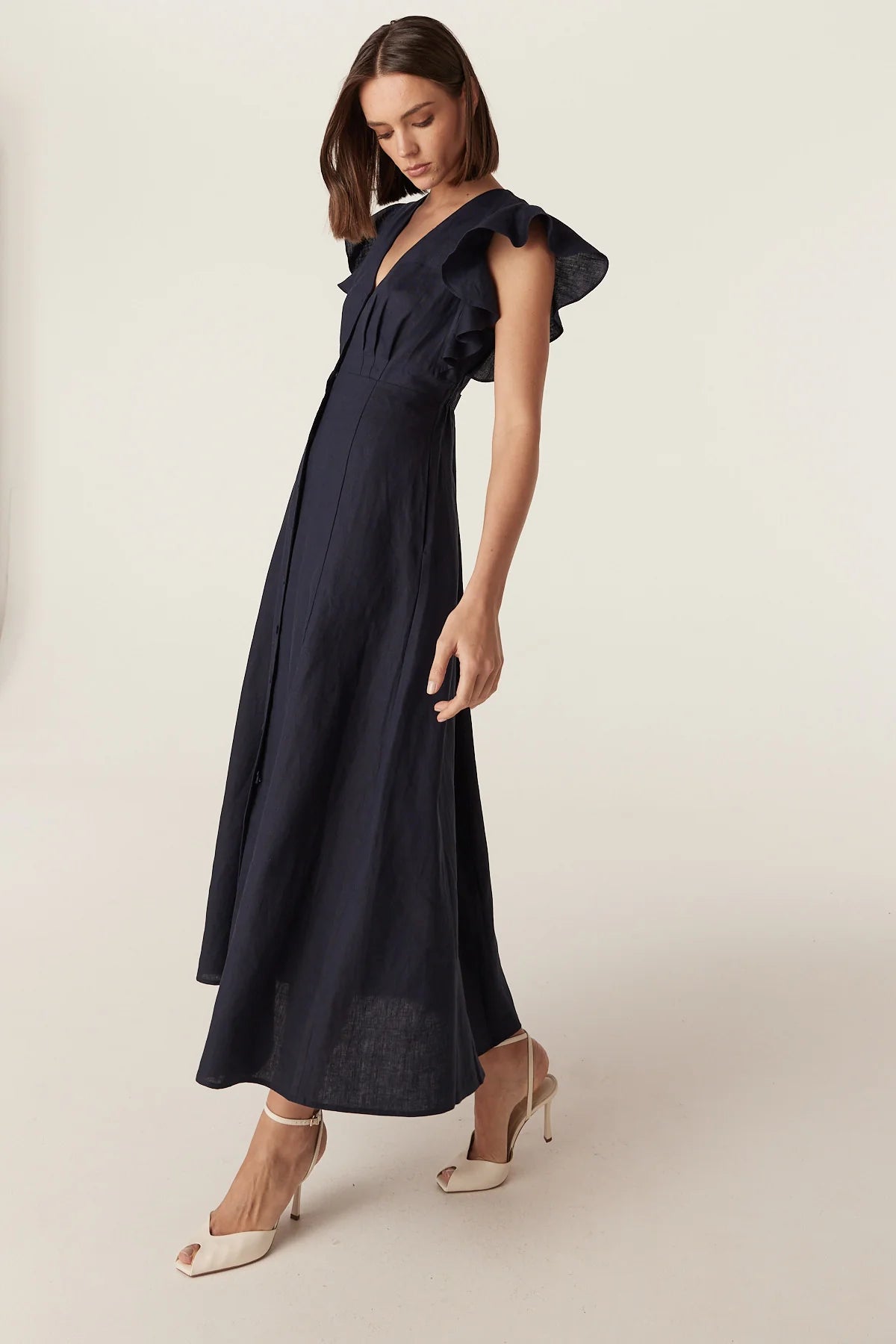 Cable Melbourne Bellevue Linen Dress in Navy, styled - walking, side view