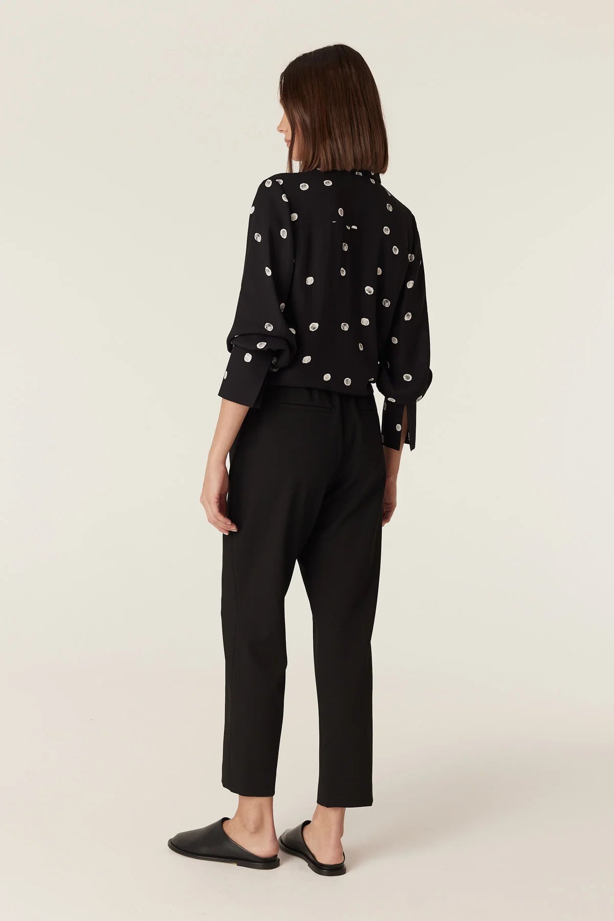 Back view of the Cable Melbourne Hepburn Blouse in Black Spot showing the relaxed fit
