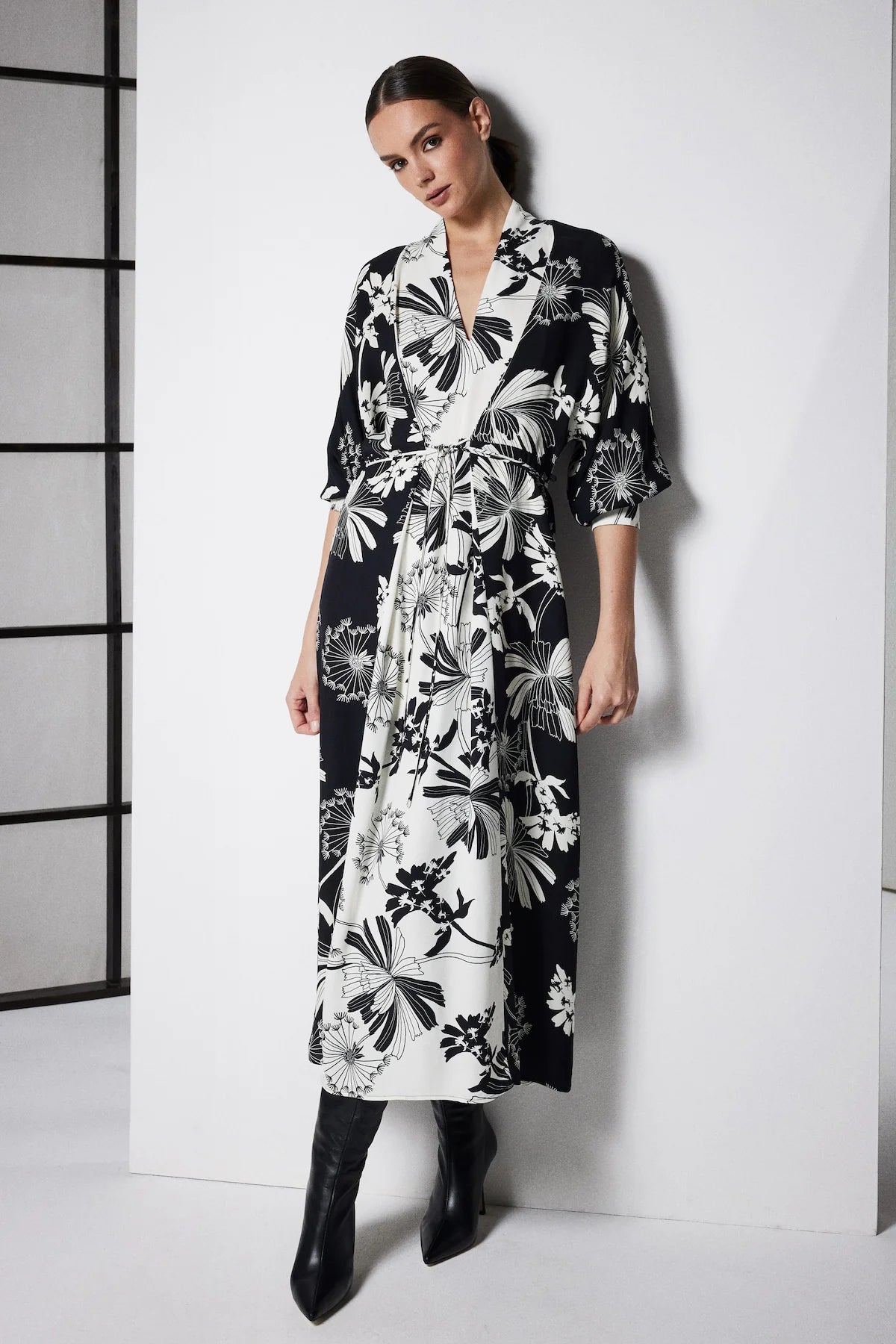 Cable Melbourne Rita Midi Dress in Deco Print styled with knee-high boots, lifestyle shot
