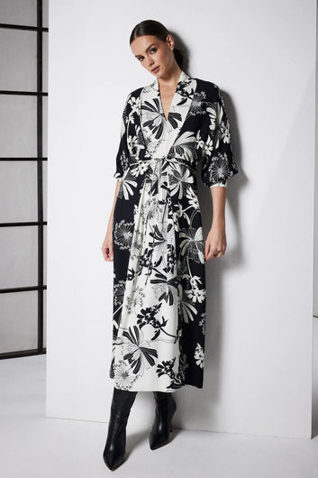 Cable Melbourne Rita Midi Dress in Deco Print styled with knee-high boots, lifestyle shot