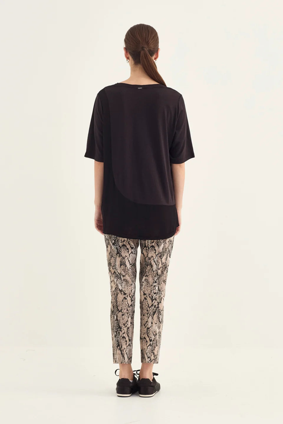 Verge Acrobat Serpent 7/8 Pant in Serpent Print, worn - back