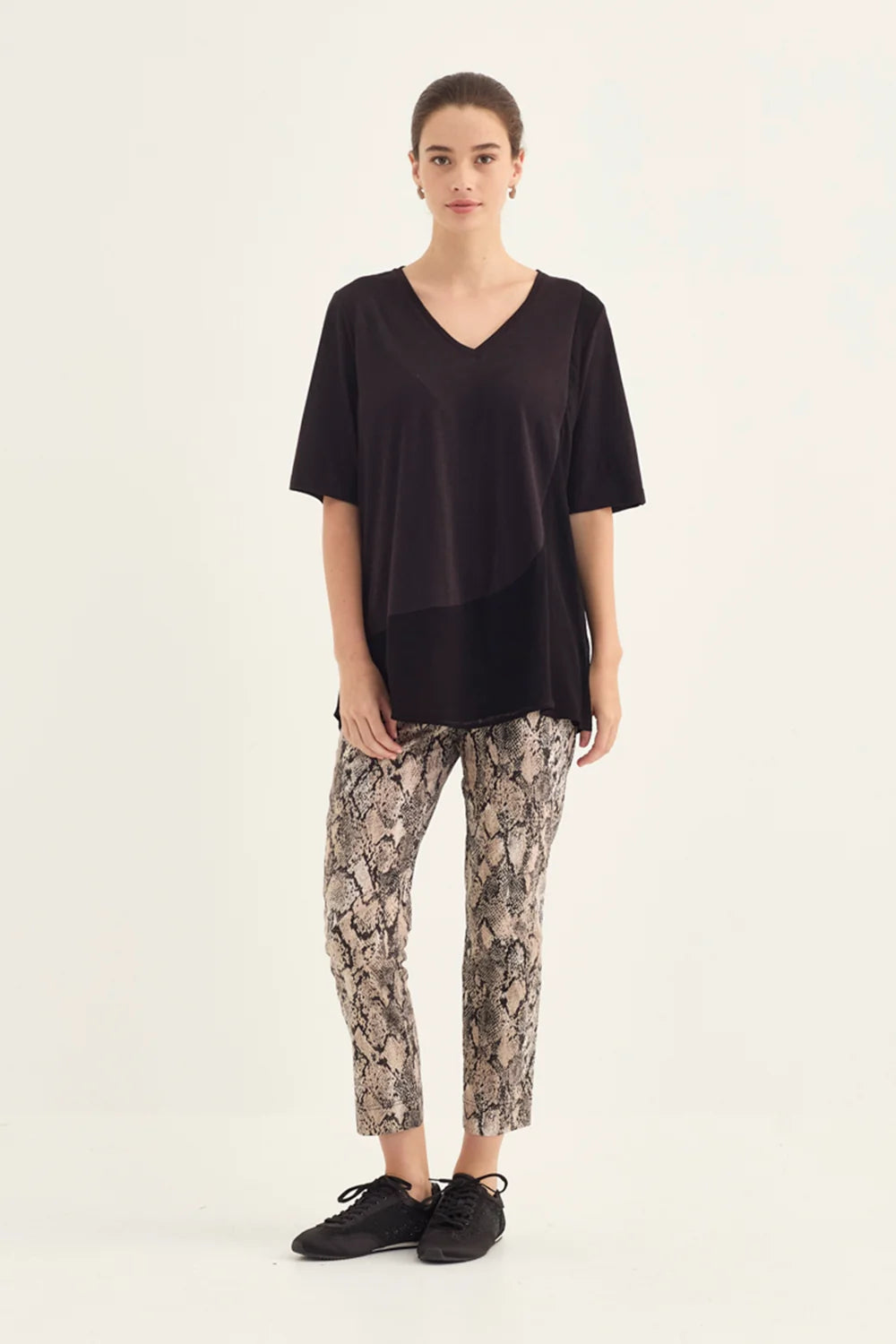 Verge Acrobat Serpent 7/8 Pant in Serpent Print, worn - front