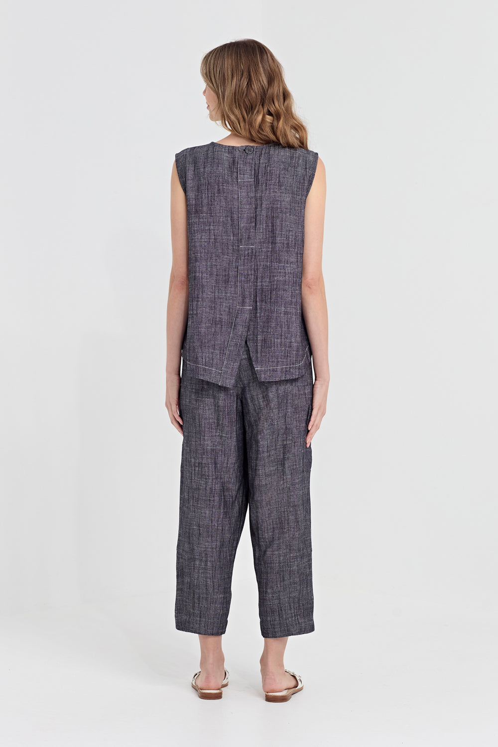 Verge Avery Tank in Ink, worn - back showing split hem