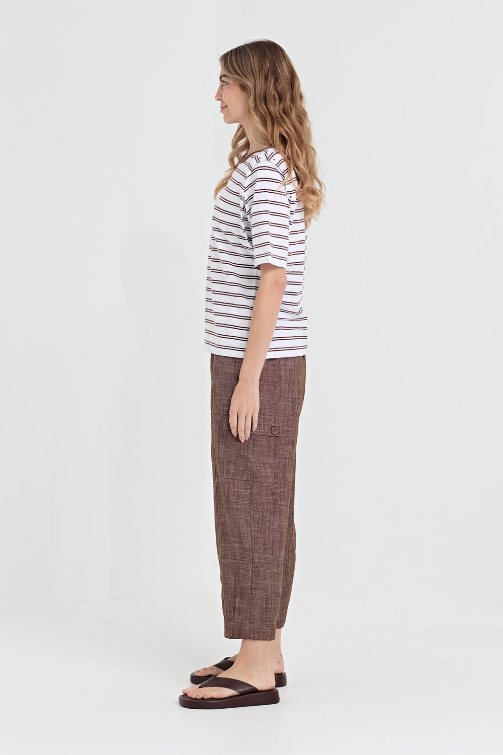 Verge Faithful Pant in Cocoa, worn - side showing cargo pocket